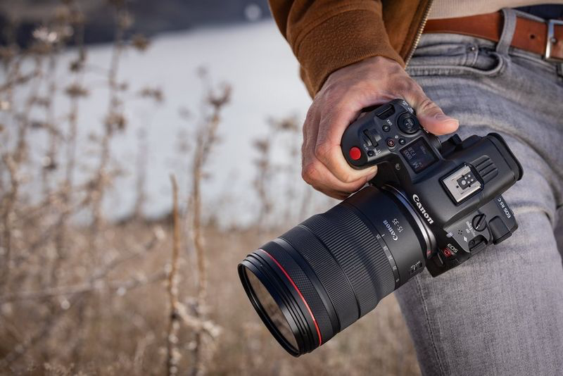 Photographe et son appareil photo